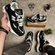 Black sneakers in the N style