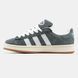 Gray retro sneakers with white stripes