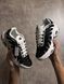 Black-and-white sneakers in the Tn style