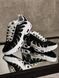 Black-and-white sneakers in the Tn style