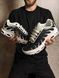 Black-and-white sneakers in the Tn style