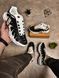 Black-and-white sneakers in the Tn style