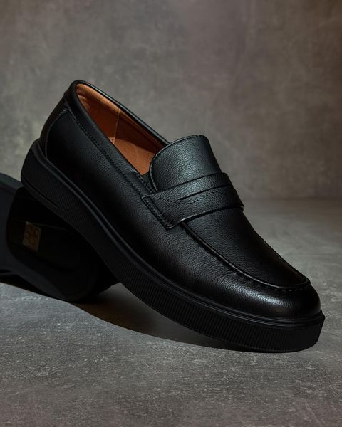 Black leather loafers with chunky soles