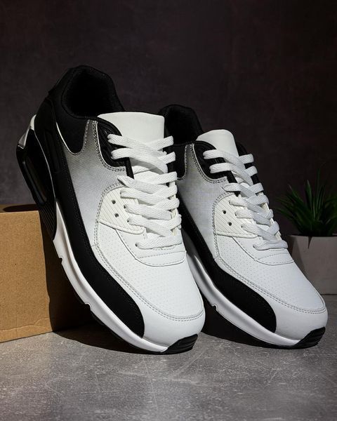 Schwarz-wei&szlig;e Sneaker im Air-Stil