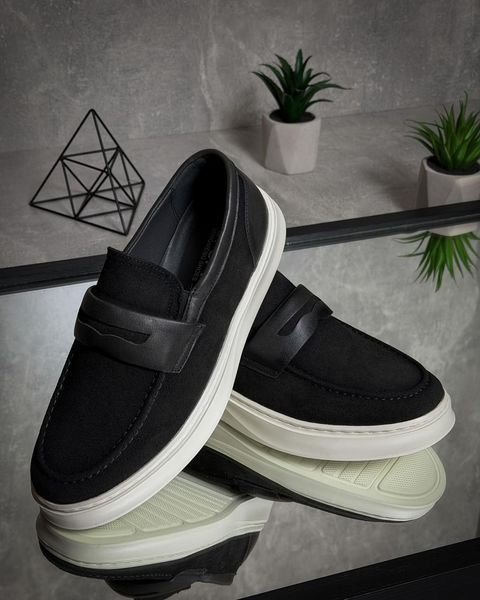 Black loafers with a massive sole (stitched)