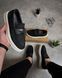 Black loafers with a massive sole (stitched)