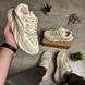 Beige lace-up sneakers