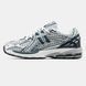 Gray athletic sneakers with mesh and accents