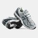 Gray athletic sneakers with mesh and accents