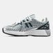 Gray athletic sneakers with mesh and accents