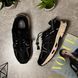 Black sneakers in the A style