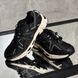 Black sneakers in the A style