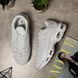 White sneakers in the Tn style