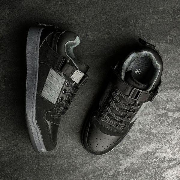Black sneakers made of genuine suede with gray accents