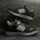 Black sneakers made of genuine suede with gray accents