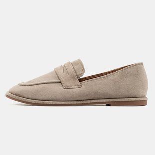Beige suede loafers with a buckle