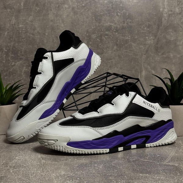 White sneakers with purple accents