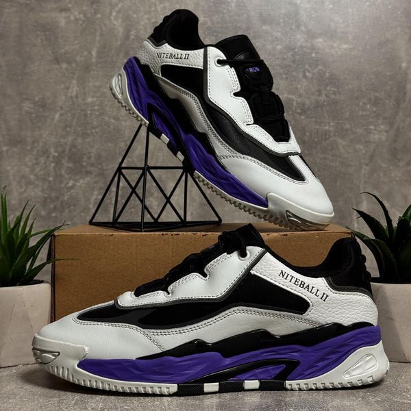 White sneakers with purple accents