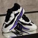 White sneakers with purple accents