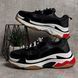 Black high-top sneakers in the Triple S style