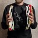 Black high-top sneakers in the Triple S style